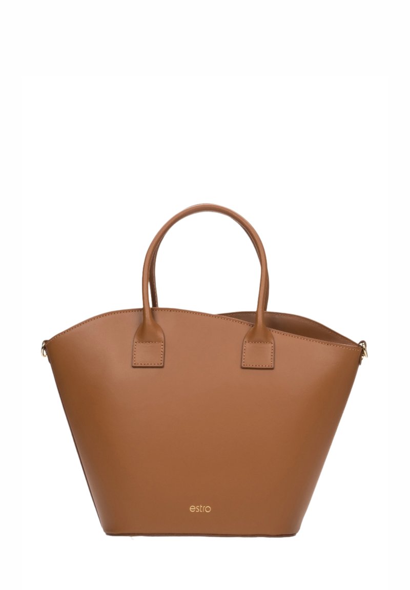 Brązowa skórzana torba typu tote z zaokrąglonym dnem, płaskim dnem i dwoma krótkimi uchwytami. Posiada subtelne logo z przodu i gładką teksturę.