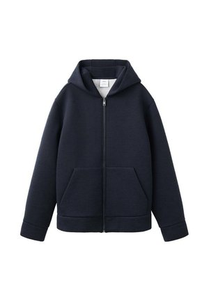 Tamnoplavi duks na patent napravljen od mekanog materijala. Ima kapuljaču, prednje džepove i rebraste manžete. Jednostavan, čist dizajn bez vidljivih uzoraka.