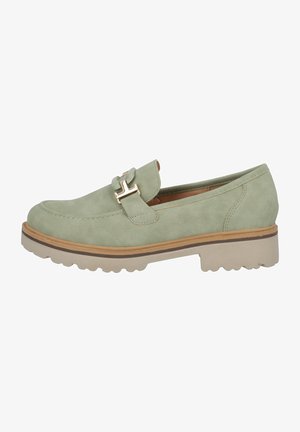Light green suede loafer with a flat, textured sole, featuring a gold-tone buckle detail and accent stitching along the edges.