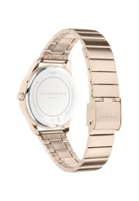 Orologio in acciaio inossidabile con finitura in oro rosa, cassa rotonda e bracciale a maglie. Presenta un fondello liscio e trasparente con dettagli di branding.