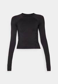 Svart långärmad crop top i elastiskt material, med rund halsringning och raglanärmar med subtil sömdetaljering.