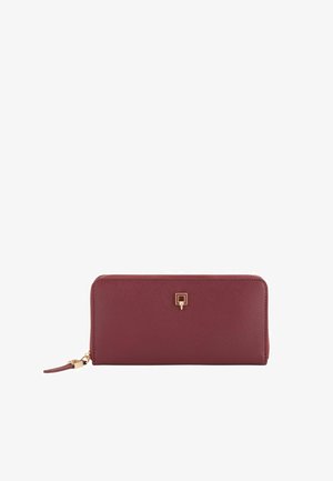 Burgundy leather wallet with a smooth texture, rectangular shape, gold hardware accent, and a zip closure. Features a minimalistic design.