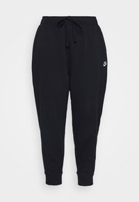 Mustat collegehousut pehmeästä kankaasta, jossa on joustava vyötärönyöri ja kiristysnauha, kapenevat lahkeet ja pieni valkoinen logo sivulla.