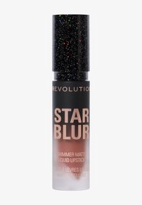 Rossetto liquido in una bottiglia a gradiente; nera con cappuccio glitterato, lettering oro rosa e parte inferiore satinata. Presenta una finitura opaca con shimmer.
