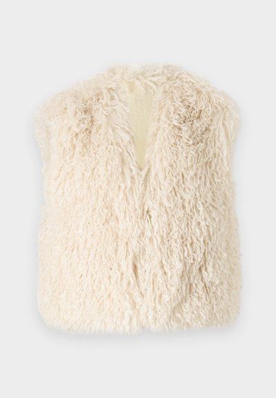 Kreemivärvi kunstkarvast vest, millel on karvane tekstuur, avatud ees ja ilma varrukateta. Omab pehmet, struktuuritu disaini, mis sobib kihiliseks kandmiseks.