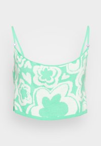 Top cropped com padrão floral verde, alças ajustáveis e textura de malha suave. Apresenta grandes flores brancas com formas variadas.