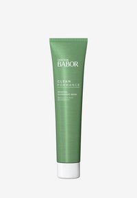 Tube vert en métal avec une finition métallique, bouchon blanc et texte l'étiquetant comme "Masque de Nuit de Rénovation Clean Formance de Doctor Babor."
