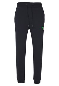 Black sweatpants made of soft fabric featuring a drawstring waist, tapered legs, and a small colored logo on the left thigh.