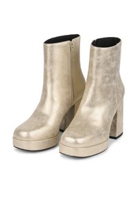 Kulta metalliset nilkkasaappaat, joissa on paksu lohko korko, alustalla ja sivuvetoketju. Tasainen pinta, jossa on hienovaraista kiiltoa.