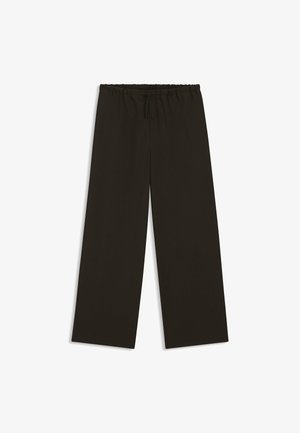 Pantaloni neri a gamba larga con vita elasticizzata e coulisse, distesi su uno sfondo bianco.