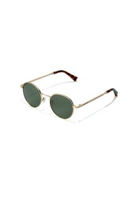 Ronde zonnebrillen met donker groene lenzen, een gouden metalen frame en bruin schildpadpatroon op de slapen. Lichtgewicht ontwerp met minimale hardware.