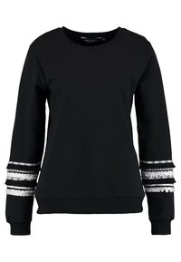 Svart sweatshirt i bomull med långa ärmar, med dekorativa silverdetaljer och texturerade band på muddarna. Rund halsringning.