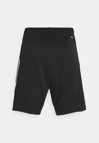 Shorts de sport noirs avec une taille élastique, texture lisse et accents blancs sur les c�ôtés. Conçus pour le confort et le mouvement.