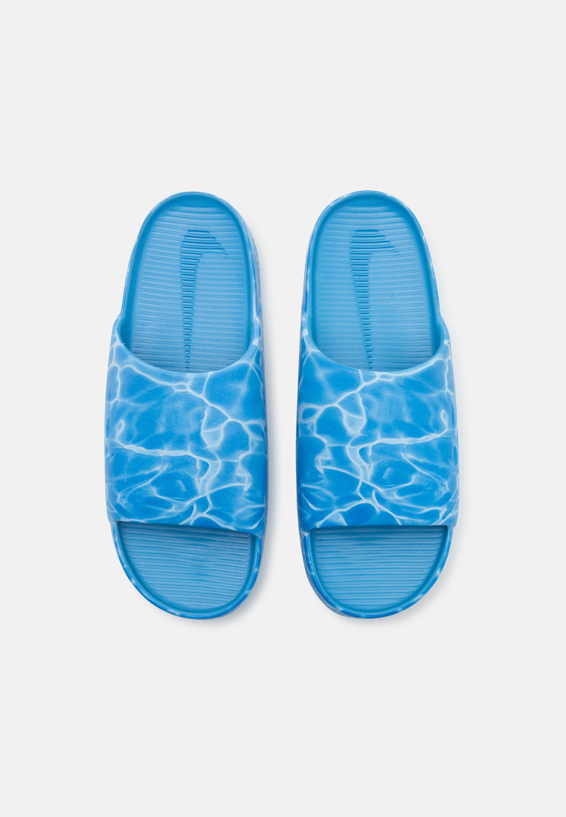 nike slippers blue and white