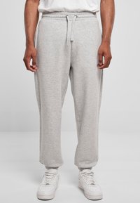 Karl Kani SMALL SIGNATURE UNISEX - Spodnie treningowe