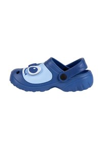 Blue children's clog with a light blue face design featuring a large eye and smiling expression. Made of lightweight, durable material.