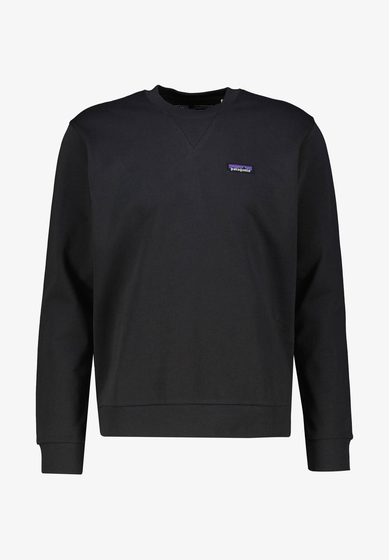 Sweat-shirt noir Patagonia à col ras du cou, manches longues et petite écusson logo sur la poitrine gauche.