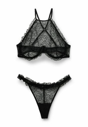 Schwarzes Spitzen-Dessous-Set mit durchsichtigen Blumenmustern, bestehend aus einem Bralette mit verstellbaren Trägern und einem passenden, gerafften Tanga.