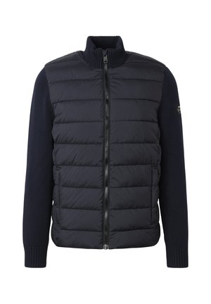 Miesten musta vetoketjullinen takki, jossa on pehmustettu etuosa ja neulotut hihat, korkea kaulus ja kaksi etutaskua.