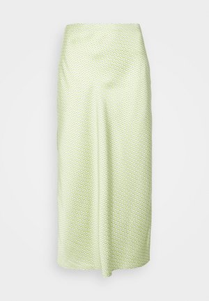 Jupe midi fluide en tissu vert clair avec un petit motif floral blanc. Dotée d'une taille haute et d'une texture lisse.