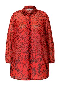 Camisa roja transparente de botones con lunares negros y un patrón floral en el dobladillo, con un cuello clásico y mangas largas.
