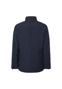 Giacca trapuntata blu navy con colletto alto, caratterizzata da cuciture diagonali, maniche lunghe e aperture sugli orli delle maniche.
