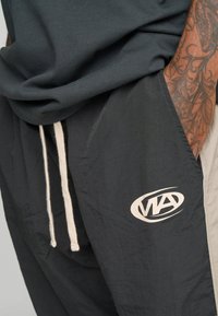 Multiply Apparel ASPHALT UNISEX - Pantalones deportivos - black soda