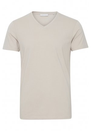 Beige v-neck t-shirt with short sleeves, made of smooth cotton fabric, featuring a simple design and a relaxed fit. No patterns or accents.