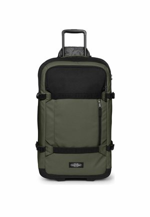 Green and black rolling suitcase with extended handle, front zipper pocket, adjustable side straps, and Eastpak logo at bottom center.