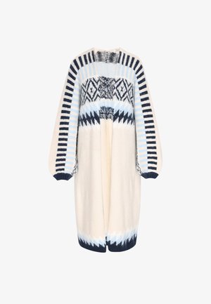 Neulecardigan vaaleassa sävyssä, jossa on sinisiä ja tummansinisä geometrisia kuvioita. Rentomallinen, leveillä kuviollisilla hihoilla ja puolipitkällä suunnittelulla.