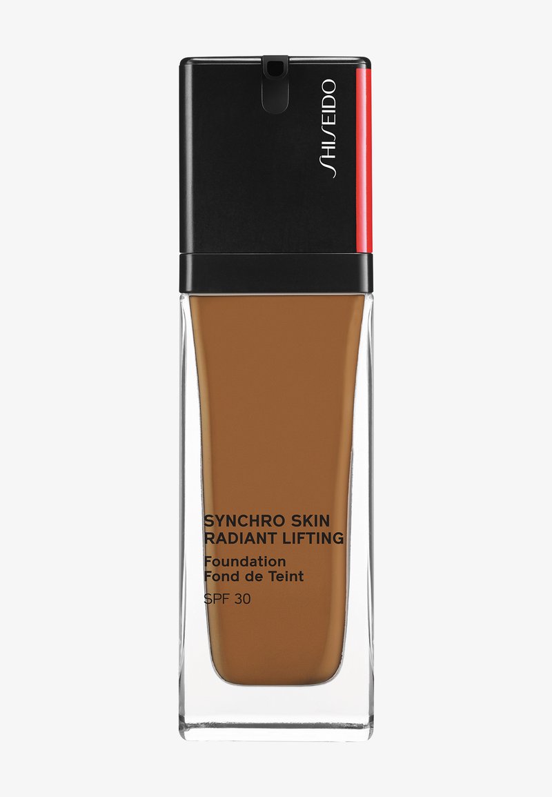 Shiseido SYNCHRO SKIN RADIANT LIFTING FOUNDATION SPF30 - Base de maquillaje - suede