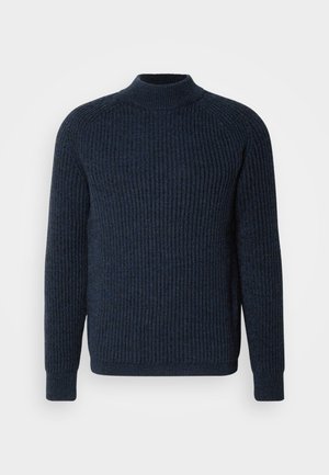 Maglione ribbed blu navy con collo alto e maniche lunghe; presenta un tessuto testurizzato e polsini aderenti.