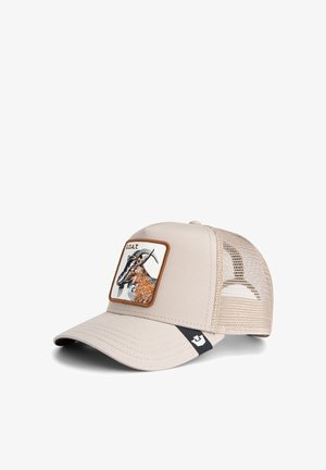 Beige mesh cap with a solid front featuring an embroidered goat graphic and the word "GOAT." Includes a curved visor and an adjustable strap.