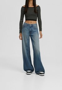 Bershka Stickad tröja - black