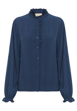 Blusa lunga blu navy con colletto alto arricciato, chiusura a bottoni e polsini arricciati. Realizzata in tessuto morbido con una leggera lucentezza.