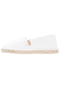 White canvas espadrille with a jute rope sole. Features a simple design, rounded toe, and a small logo tag on the side.