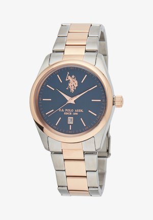 Orologio in metallo argento e rosé con quadrante blu, logo, indicatori delle ore e display della data. Presenta un design del bracciale a maglie.