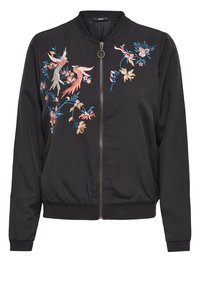 Giubbotto bomber nero con ricami floreali in rosa, blu e giallo. Presenta una chiusura con zip, polsini a coste e scollatura rotonda.