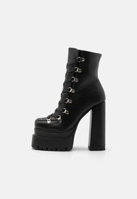 RAID KAMALA - Botines con plataforma - black