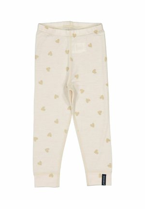 Cremefarvede baby leggings med lysebrune hjerter og et lille sort mærke nær anklen.