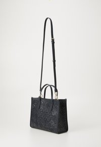 Tommy Hilfiger CITY MINI TOTE MONO - Håndtasker - space blue
