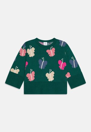 Ciemnozielony dziecięcy sweter z wielokolorowymi motylkami w różu, fioletach i beżu, z prążkowanymi mankietami i dołem.