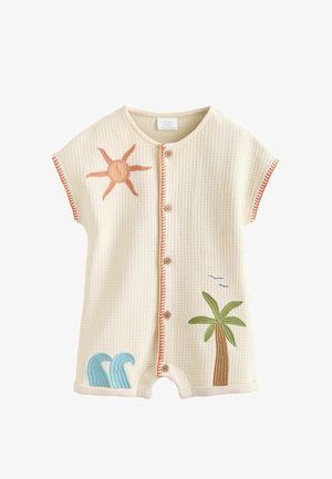 Kermanvärinen vohvelikuvioinen vauvahaalari, jossa edessä napit, oranssi aurinko, vihreä palmupuu ja siniset aaltokoristeet sekä oranssit reunukset hihoissa ja etuosassa.