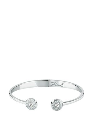 Bracelet manchette ouvert en argent avec cristaux clairs et "Karl Lagerfeld" gravé sur les embouts ronds et la signature intérieure du bracelet.