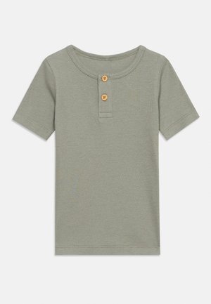 Short-sleeve ribbed light green shirt with round neck and two wooden buttons on the front placket.