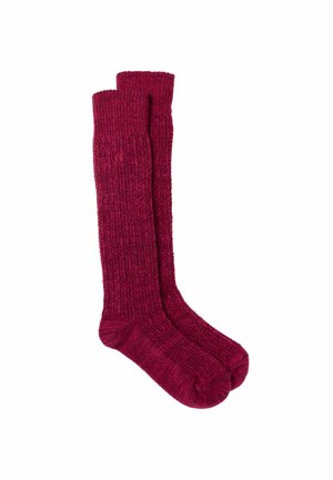 Paire de longues chaussettes épaisses tricotées de couleur rouge foncé, posées à plat avec texture visible sur fond blanc.