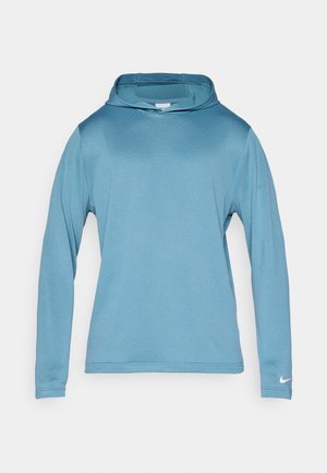 Felpa con cappuccio a maniche lunghe di colore blu, realizzata in tessuto testurizzato, con un colletto alto e un piccolo logo Nike bianco sulla manica destra.