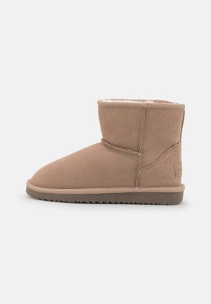 Taupe suede winter ankle boot with flat sole and visible stitching, shown in side profile on a white background.