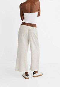 Stradivarius Tygbyxor - mottled beige