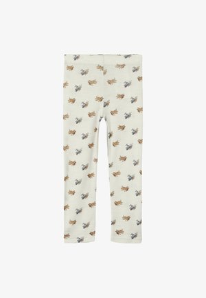 Katoenen leggings met een lichtcrème basis met een herhaald patroon van vintage-stijl vliegtuigen in bruine en blauwe tinten.